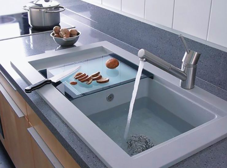 big modern kitchen sink with sliding cutting board