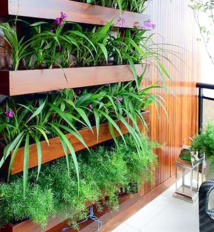 horizontal plantters on apartment balcony garden