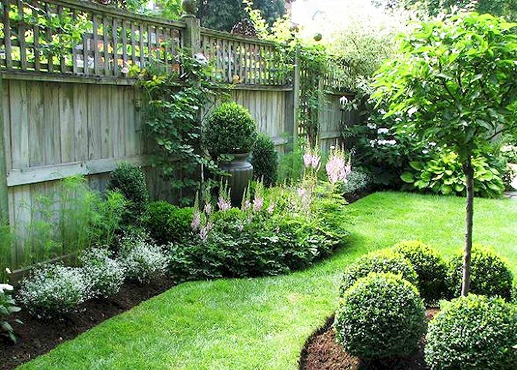 high wooden privacy fence with lattice top