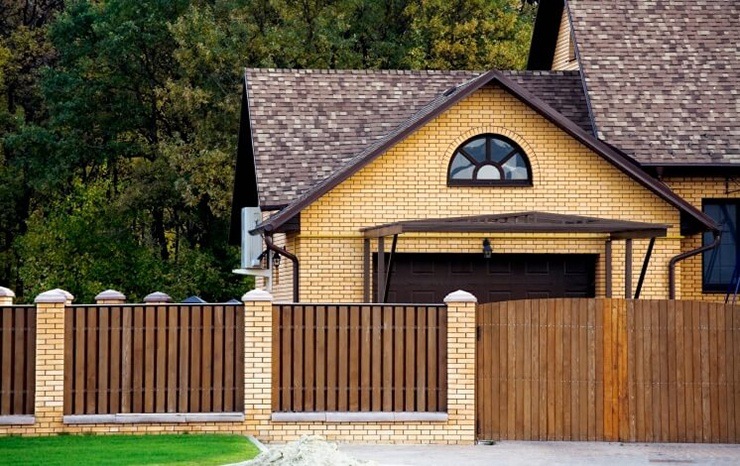 wooden flat top brick fence