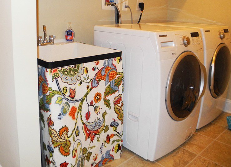 sink skirt to hide exposed pipes in laundry room