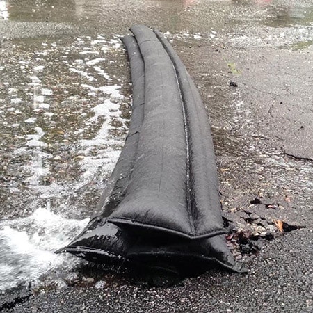 the quick dam alternatives to sandbags for flooding are perfect for front doors and garage doors