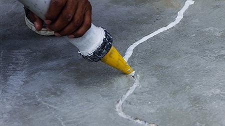 fixing cracks in garage floor