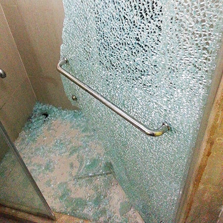 broken glass shower door