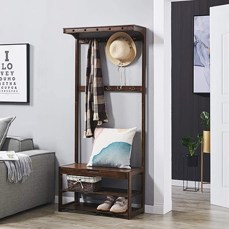 coat rack shoe bench in bedroom as a closet alternative