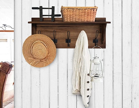 a shelf with hooks is a super convenient way to hang clothes you're still going to wear that aren't yet dirty