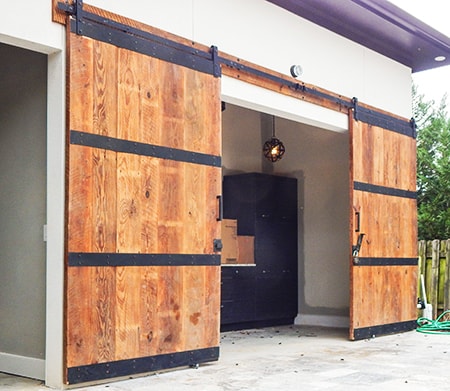 barn doors as garage door alternatives are a great and attractive solution to the traditional option