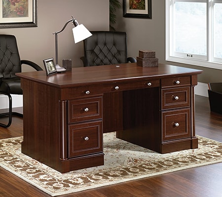 executive desks are meant to be situated in the center of a room to command respect and authority