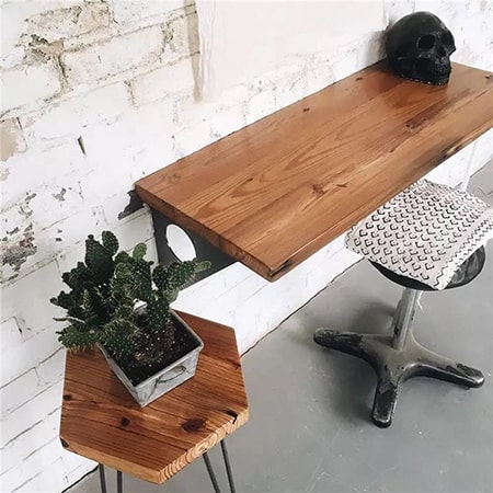 floating wall desks save tons of space underneath and frankly just look cool