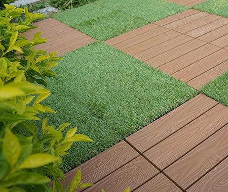 interlocking grass deck tiles look amazing and bring color to your outdoors area