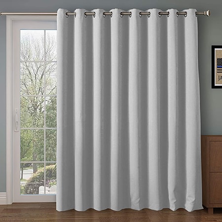 single panel curtains cover an entire window or sliding glass door with one long curtain