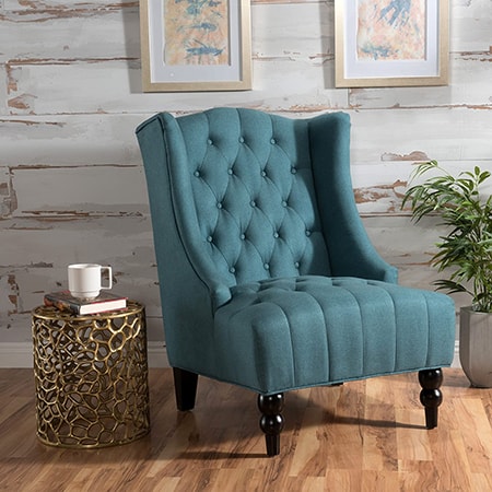 wingback chair are fancy types of chairs that don't have arms and the wings don't stick out much. it's mainly for decorative reasons