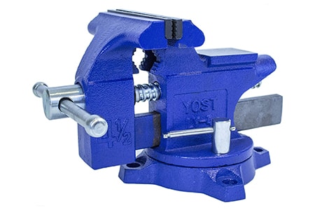 a bench vise is secured to your work bench and then can hold objects in various positions so you can work on them