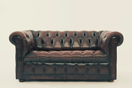 the chesterfield couch is one of those styles of couches that seem masculine and makes one think of a CEO's office