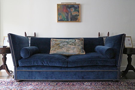 knole sofa designs have straight backs that require pillows to be used to lean back on