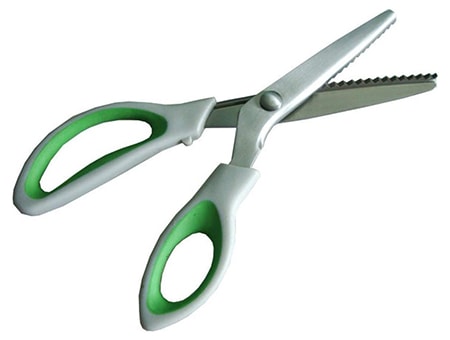 pinking shears are designed to leave a zig zag pattern behind to keep fabric weave from snagging