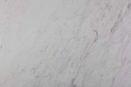 white himalaya varieties of marble  are subdued but very grey in color