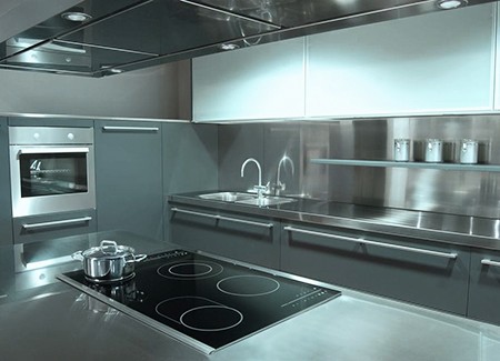 industrial kitchen design styles feature a lot of stainless steel, flat surfaces, and are meant to be durable and easy to clean