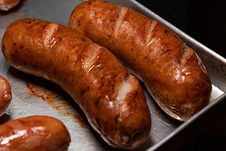 recipes of some kinds of sausages like chorizo smoked pork sausage date back to the roman empire