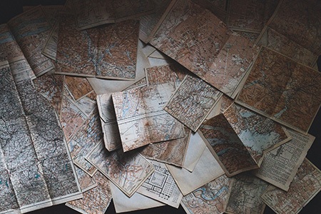 if you are looking for stylish wallpaper alternative, try using old maps