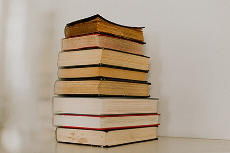if you love reading books and have lots of them a simple stack of books can be great alternative to coffee table