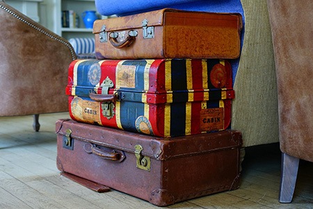 stacked suitcases can be great nightstand alternatives