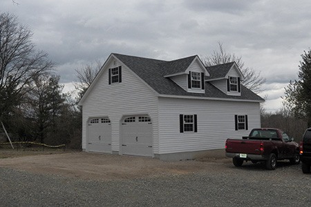 there are different styles of garages, like carriage house garage, that combines both garage and house concept into one
