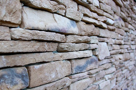 natural stone walls can be a great alternative to retaining wall