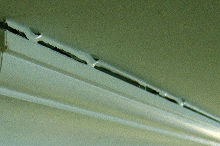cracks between wall & ceiling
