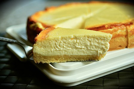 some varieties of cheesecake, like german cheesecake,is very dense due to the usage of sour cream