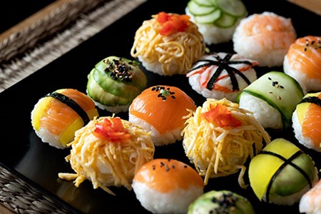 some types of sushi are rolled up into different shapes and temari is famous with its ball shape