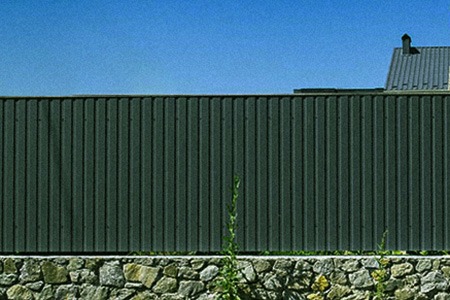 one of the ways to block neighbor's view is to use corrugated metal fence