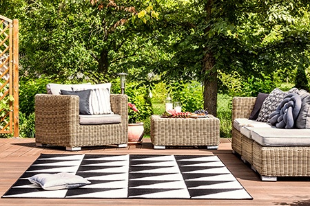what material should you choose for your outdoor rug, and can outdoor carpet get wet?