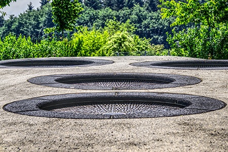 burying the trampoline in-ground is one of the best under trampoline ideas