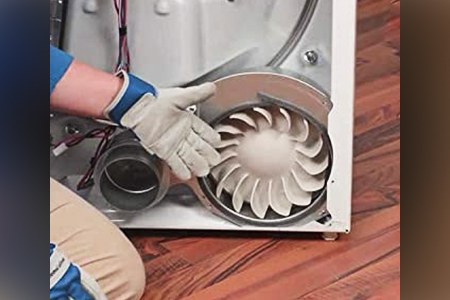 examine the dryer blower wheel if you're experiencing a dryer overheating