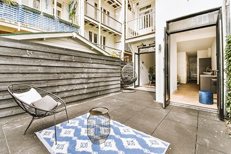 you may wonder if it is okay to put outdoor rug on concrete patio that is not covered; it totally depends on the rug's material