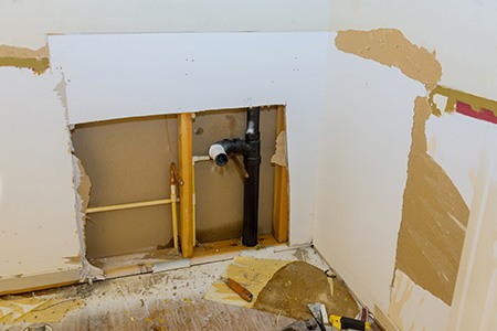 leaky pipes could be contributing to a stinky laundry room