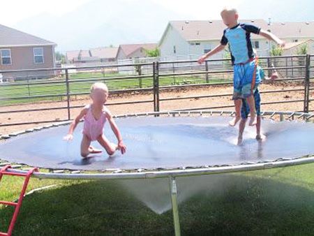 sprinkler under trampoline