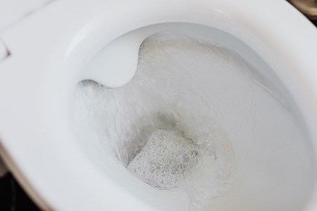 will a toilet eventually unclog itself?