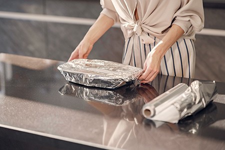 is it safe to put aluminum foil in the oven? well although it is safe to use aluminum foil in the oven you should not use it in the microwave