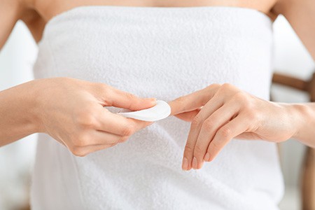 how to get expanding foam off your hands? try applying nail polish remover