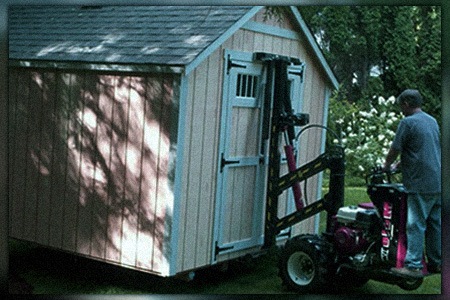 moving a shed across the yard is possible with using a forklift