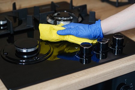 after completing necessary cleaning steps for black glass top stove discoloration you have to wipe everything down using a microfiber cloth