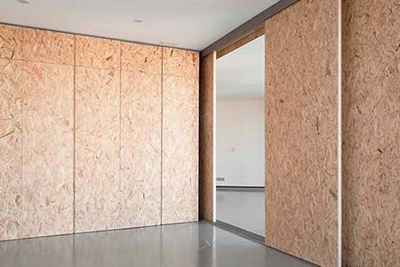 chipboard aka particle board can be used as types of paneling for walls