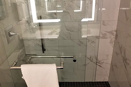 tips for installing sliding shower doors in accordance with shower door code requirements