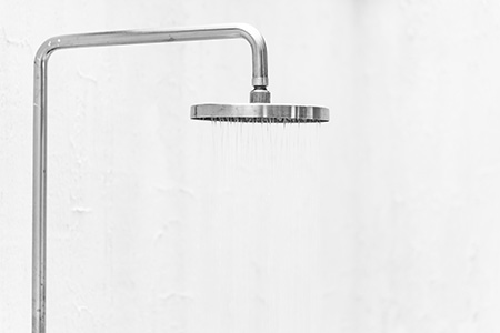if your shower head is too high, there are various types of shower head you can try