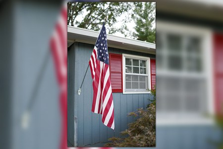 why does it matter where to mount the flag on your house?