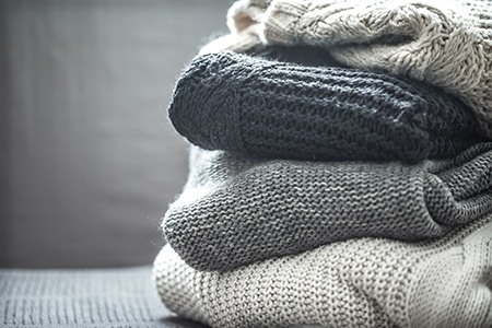 should you hang or fold sweaters for storage? here you can learn best ways to store sweaters