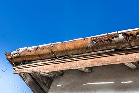 what are the signs i need to install gutters on my roof? is a gutter without a downspout okay?