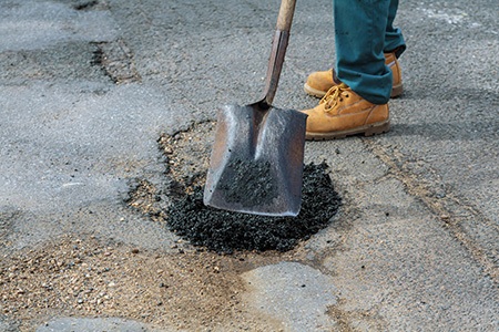 reseal the driveway or sidewalk